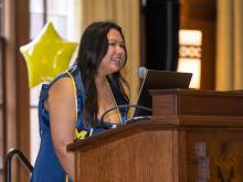 An IGR graduate addresses attendees