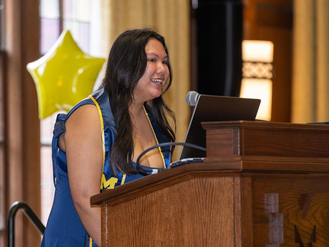 An IGR graduate addresses attendees
